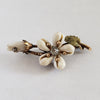 Circa 1860 Early Victorian Cowrie Shell Green and Yellow Gold-Filled Flower Brooch