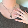 1930s Handwrought Silver Left Hand Charm Necklace