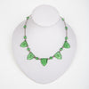 Elegant 1920s Art Deco molded and etched glass necklace, in a pretty peridot color. 