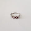 Late Victorian Sterling Silver Baby Ring with Ruby Red Brilliants