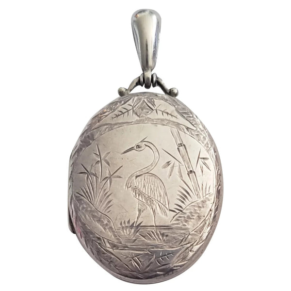 Circa 1885 Victorian Aesthetic Movement Hand Engraved Sterling Silver Locket with Crane