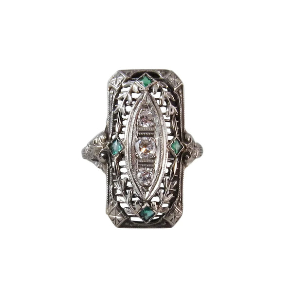 Circa 1910 18k White Gold Edwardian Filigree Ring with Diamonds and Emeralds